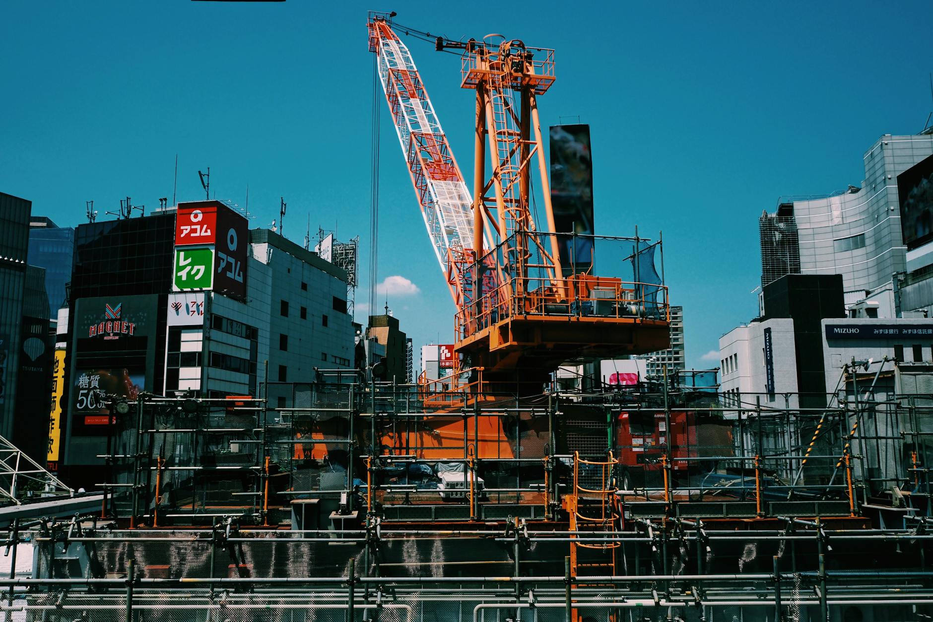 a crane is sitting on top of a building